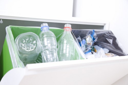 Waste clearance team handling mixed non-hazardous rubbish