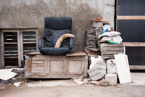 Rubbish removal crew preparing a collection on site