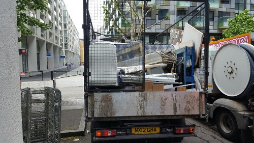 Flat clearance team handling items in a residential apartment building