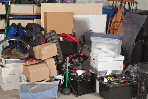 Bulky items and mixed rubbish prepared for collection in a residential area
